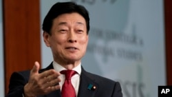 2023年1月5日，日本经济产业大臣西村康稔在华盛顿战略与国际研究中心发表讲话。（美联社照片）