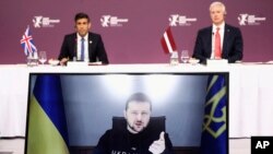 乌克兰总统泽连斯基2022年12月19日通过视频在联合远征军会议上讲话。