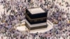 Muslim pilgrims walk around the Kaaba, the cubic building at the Grand Mosque, during the annual hajj pilgrimage, in Mecca, Saudi Arabia, on July 10, 2022.