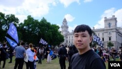 流亡英国的前香港区议员李轩朗。（美国之音郑乐捷）