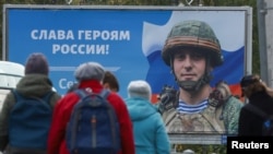 俄罗斯圣彼得堡一面宣传俄军士兵的标语牌。(2022年9月21日)