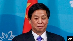 中共中央政治局委员栗战书在符拉迪沃斯托克会见俄罗斯总统普京。(2022年9月7日)