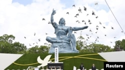 日本长崎和平公园纪念长崎遭受原子弹袭击75周年(照片由共同社、路透社提供)