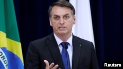 巴西总统雅伊尔·梅西亚斯·博索纳罗(Jair Bolsonaro)2019年9月30日在首都巴西利亚讲话.