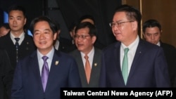 2025年2月20日,台湾总统赖清德(左前)与台湾国家安全委员会主席吴钊燮(右前)出席在台北举行的哈利法克斯国际安全论坛会议。