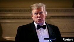 资料照:美国总统特朗普2019年2月24日在白宫宴会厅谈美中贸易关系。