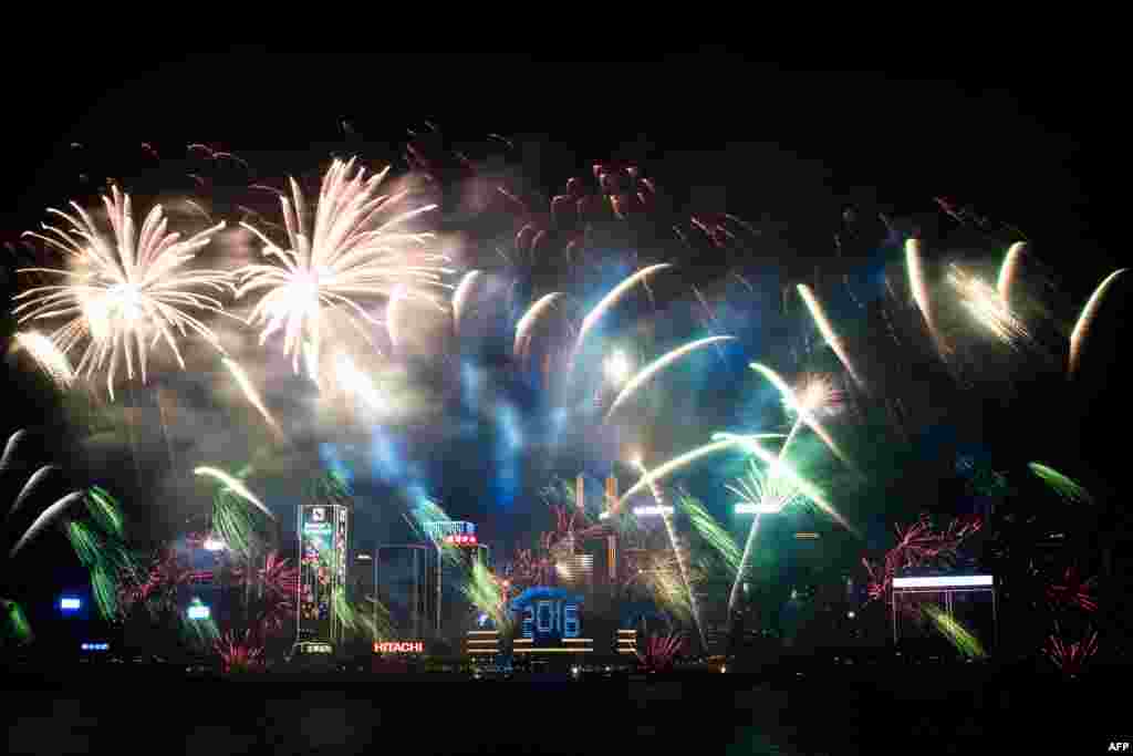 Fireworks are seen over the city's skyline in Hong Kong on January 1, 2016