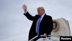 特朗普2018年10月13日离开华盛顿出席一个竞选集会(路透社)