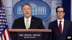 美国国务卿蓬佩奥(左)和财政部长姆努钦在白宫的记者会上宣布对伊朗实施新一轮严厉制裁。(2020年1月10日)