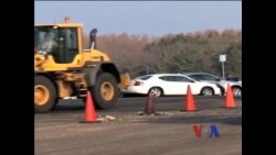 看天下: 桑迪风暴毁坏的汽车被指威胁环境 看天下: 桑迪风暴毁坏的汽车被指威胁环境