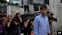 资料照片:前香港众志秘书长黄之锋2019年10月29日在记者会上。