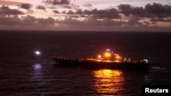 资料照片:中国解放军海军辽宁号航空母舰参加在台湾以东举行的“联合利剑-2024B ”军事演习。(2024年10月14日)