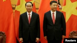 Chủ tịch Việt Nam Trần Đại Quang và Chủ tịch Trung Quốc Tập Cận Bình gặp mặt tại Đại lễ đường nhân dân Trung Quốc hôm 11/5.