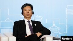 中国财政部长刘昆2018年5月28日在上海出席新开发银行（又称金砖国家开发银行）第三届年会。