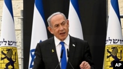 以色列总理本雅明·内塔尼亚胡(Benjamin Netanyahu)2024年5月12日在一场纪念演说中表示,以军将持续战斗直到获得最终胜利。(美联社)
