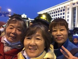 北京异议人士野靖春(中)(野靖春提供)