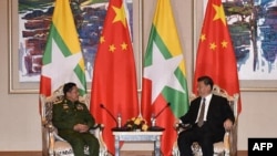 中国国家主席习近平18日会晤缅甸军方领导人敏昂来。