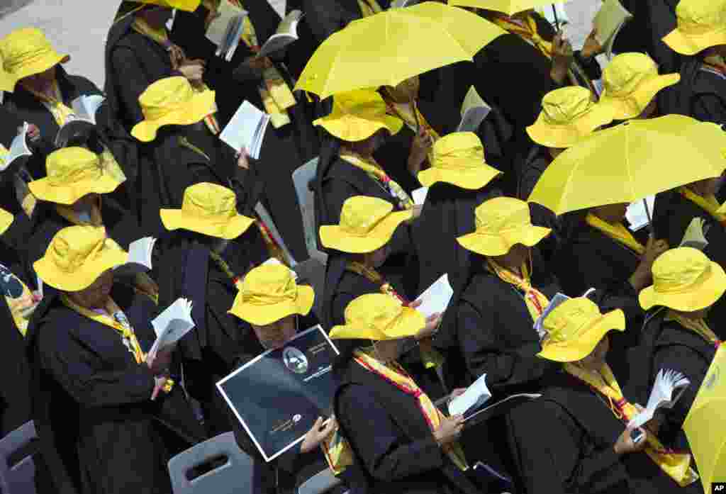 Nuns attend the canonization ceremony of four new saints led by Pope Francis in St. Peter's Square at the Vatican, May 17, 2015.