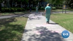 VOA英语视频: 粉笔彩绘温暖抗疫人员疲惫的心 VOA英语视频: 粉笔彩绘温暖抗疫人员疲惫的心