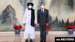 中国外长王毅今年7月在天津会晤塔利班代表