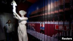 A helicopter from the Andalusian Firefighting Service (INFOCA) drops water over scrub land during a forest fire in Los Barrios, near Cadiz. Since July 19 wildfires have ravaged nearly 39,000 hectares of land in Spain, according to the provisional figures from the agriculture ministry.<br />
 