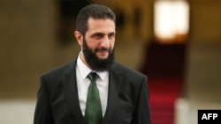 ဆီးရီးယားနိုင်ငံက အာဏာရှင်သမ္မတ Bashar al-Assad ကို ဖြုတ်ချခဲ့တဲ့ HTS ခေါ် Hayat Tahrir al-Sham အဖွဲ့ရဲ့ ခေါင်းဆောင် Al-Sharaa (ဇန်နဝါရီ ၁၆၊ ၂၀၂၅)