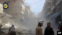 Hình tư liệu - Các thành viên nhóm Dân quân Tự vệ Syria tại Aleppo, ngày 12 tháng 10 năm 2016.