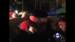 香港罢工工人冒雨抗议