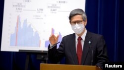 资料照:日本政府新冠对策小组会会长尾身茂在记者会上。(2021年2月2日)