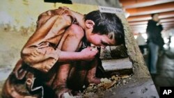 Một bức ảnh chụp trẻ em Triều Tiên đói kém được trưng bày trong một cuộc triển lãm ở Hàn Quốc.