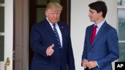 面对特朗普的关税威胁,加拿大驻美国大使克尔斯滕·希尔曼表示,加拿大准备自美国购买更多产品,包括下一批潜艇。(美联社:2019年6月20日)