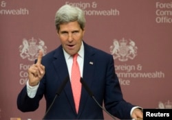 9月9日克里在与英国外交大臣黑格尔共同举行的记者会上。