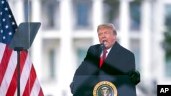 资料照片：2021年1月6日，特朗普在华盛顿抗议拜登获得总统选举团认证时发表讲话。（美联社照片）