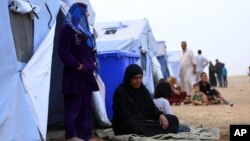 Những người tỵ nạn Mosul tại trại tỵ nạn Khazir bên ngoài Irbil, cách thủ đô Baghdad khoảng 350km về phía bắc.