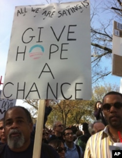 参加集会者举牌,希望美国人重拾希望。