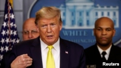 特朗普总统在白宫谈论新冠病毒疫情和美国的应对与救济措施。(2020年3月9日)