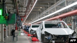 资料照片:特斯拉公司位于德克萨斯州奥斯汀的生产线。(2022年4月7日)
