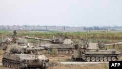 以色列军队装甲车辆在加沙地带边境地区集结。(2023年10月9日)