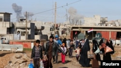 逃离摩苏尔以北战火的伊拉克平民(2016年12月30日)