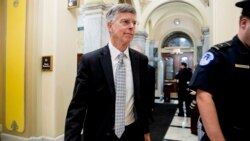 威廉·泰勒离开众议院弹劾调查的闭门听证会场。(2019年10月22日)