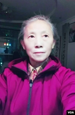 要求北京市政府公开雷洋案和解协议内容的北京市民谢小玲。(资料照片)