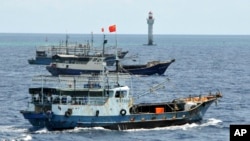 资料照片:中国渔船在南中国海航行。(2012年7月18日)