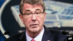 Saleh Hassan al-Faqeh holds the hand of his four-month-old daughter, Hajar, who died at the malnutrition ward of al-Sabeen hospital in Sana'a, Yemen. Fouad al-Reme, a nurse in the hospital, said Hajar was conscious when she came to the hospital but she suffered low oxygen levels. "She was like skin on bones, her body was emaciated," he said.