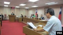 Anusha Kumari, center, weeps during a mass burial for her husband, two children and three siblings, all victims of Easter Sunday's bomb attacks, in Negombo, Sri Lanka.