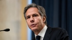 拜登的国务卿人选布林肯(Anthony Blinken)2021年1月19日在参议院外委会接受质询(路透社转发媒体联访照片)