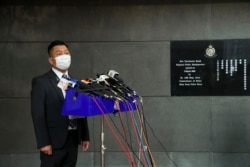 香港警方高级警司罗国凯2021年6月4日早上11时半会见传媒,讲述支联会副主席邹幸彤被捕的情况