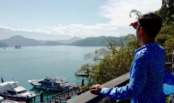 研究生W同学游览日月潭 (W同学提供)