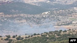 黎巴嫩真主党武装分子2023年11月23日对以色列与黎巴嫩边境附近的目标发动火箭袭击。（法新社照片）