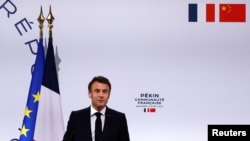 法国总统马克龙(Emmanuel Macron)2023年4月5日抵达北京后发表演讲。(路透社)