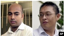 Myuran Sukumaran (trái) và Andrew Chan, hai người Úc buôn ma túy đang chờ bị tử hình.